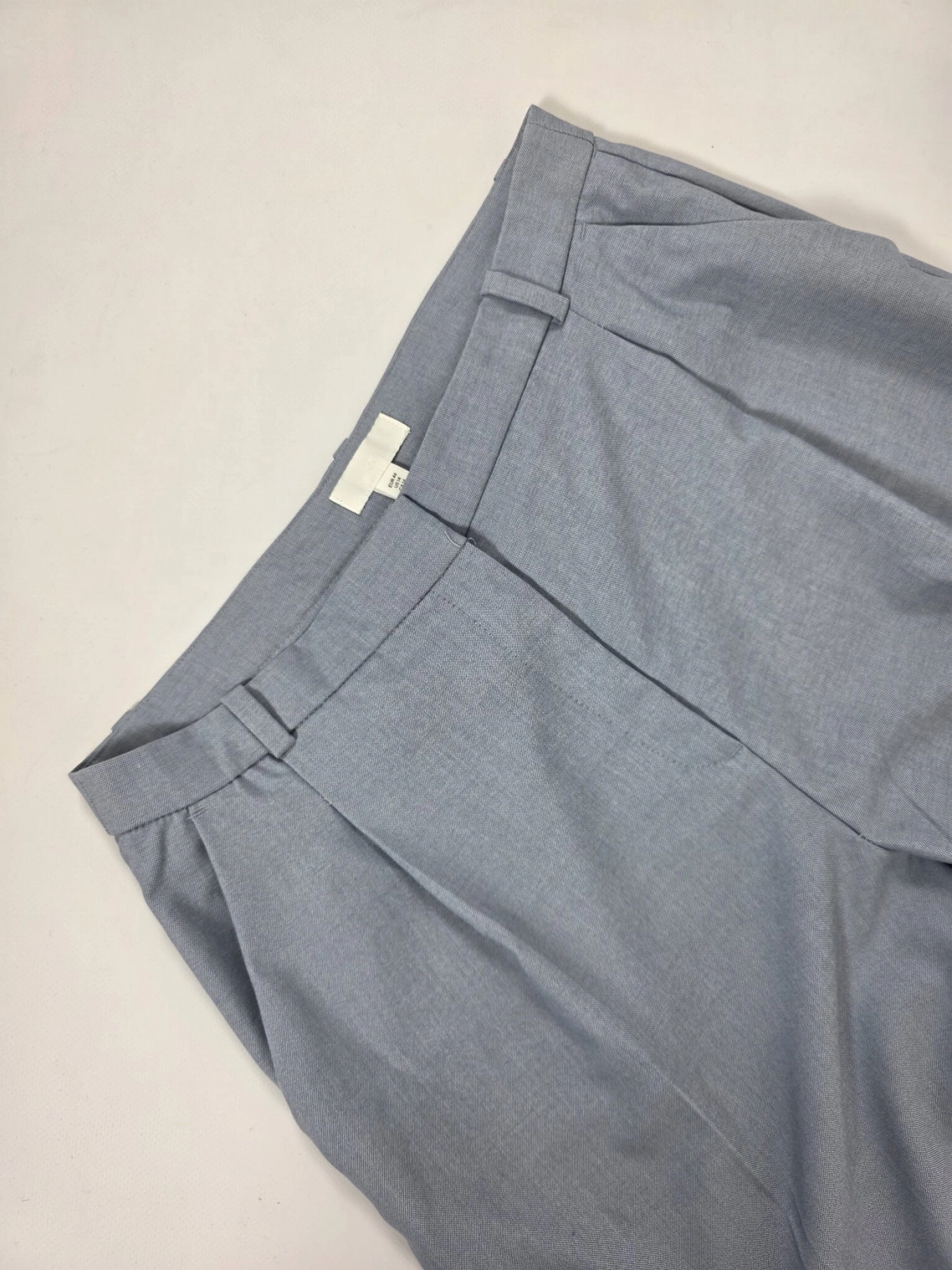 Błękitny komplet: pasiasta bluzka i eleganckie spodnie rozm.46