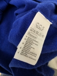 Oversizowy sweter marki COS z czystej wełny