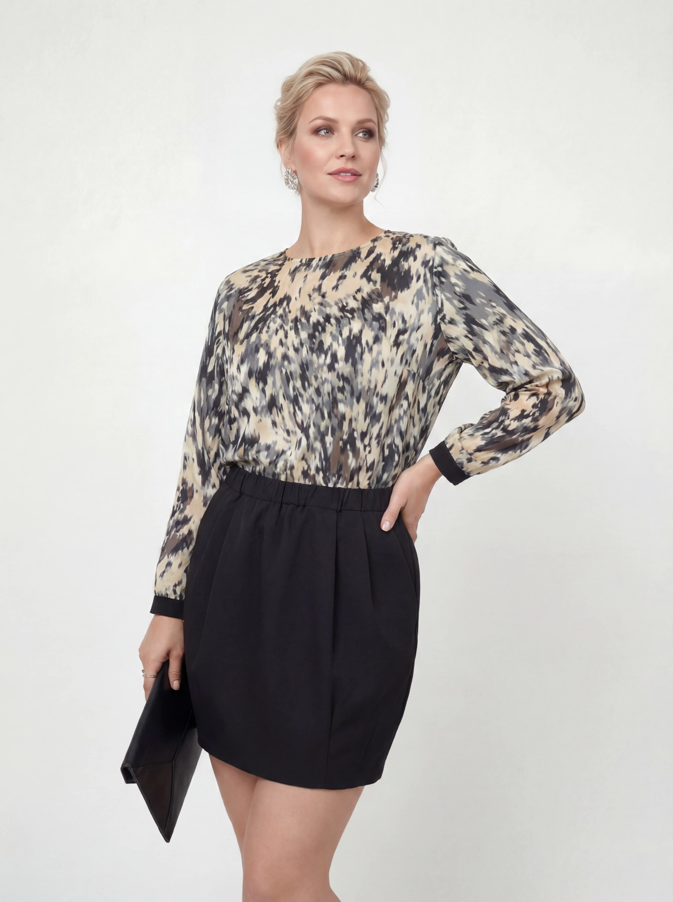 Elegancki set: bluzka Sisley i spódnica WE