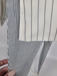Komplet damski premium składający się z prążkowanej kamizelki ASOS DESIGN, spodni oraz czarnej bluzki United Colors of Benetton