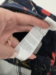 Stylizacja premium z lnianą koszulą Zara w kolorze zielonym oraz kwiecistymi spodniami s.Oliver Shape Ankle podkreślającymi sylwetkę