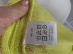 Limonkowy sweter damski marki Solar wykonany w 100% z wysokiej jakości lnu, idealny do letnich, eleganckich stylizacji premium.