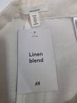 Komplet damski premium składający się z lnianych spodni H&amp;M, szałwiowej bluzki Monki oraz jedwabnego szala