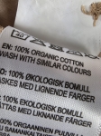 Długa beżowa koszula damska Bik Bok wykonana z 100% bawełny organicznej, idealna jako tunika w stylu oversize do eleganckich i codziennych zestawień