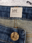 Jeansy Lee z delikatnym przetarciem