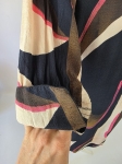 Oryginalna wzorzysta sukienka midi marki Fransa w rozmiarze XL, uszyta z ekologicznej wiskozy Lenzing Ecovero, idealna na wyjątkowe okazje i do codziennych, eleganckich stylizacji