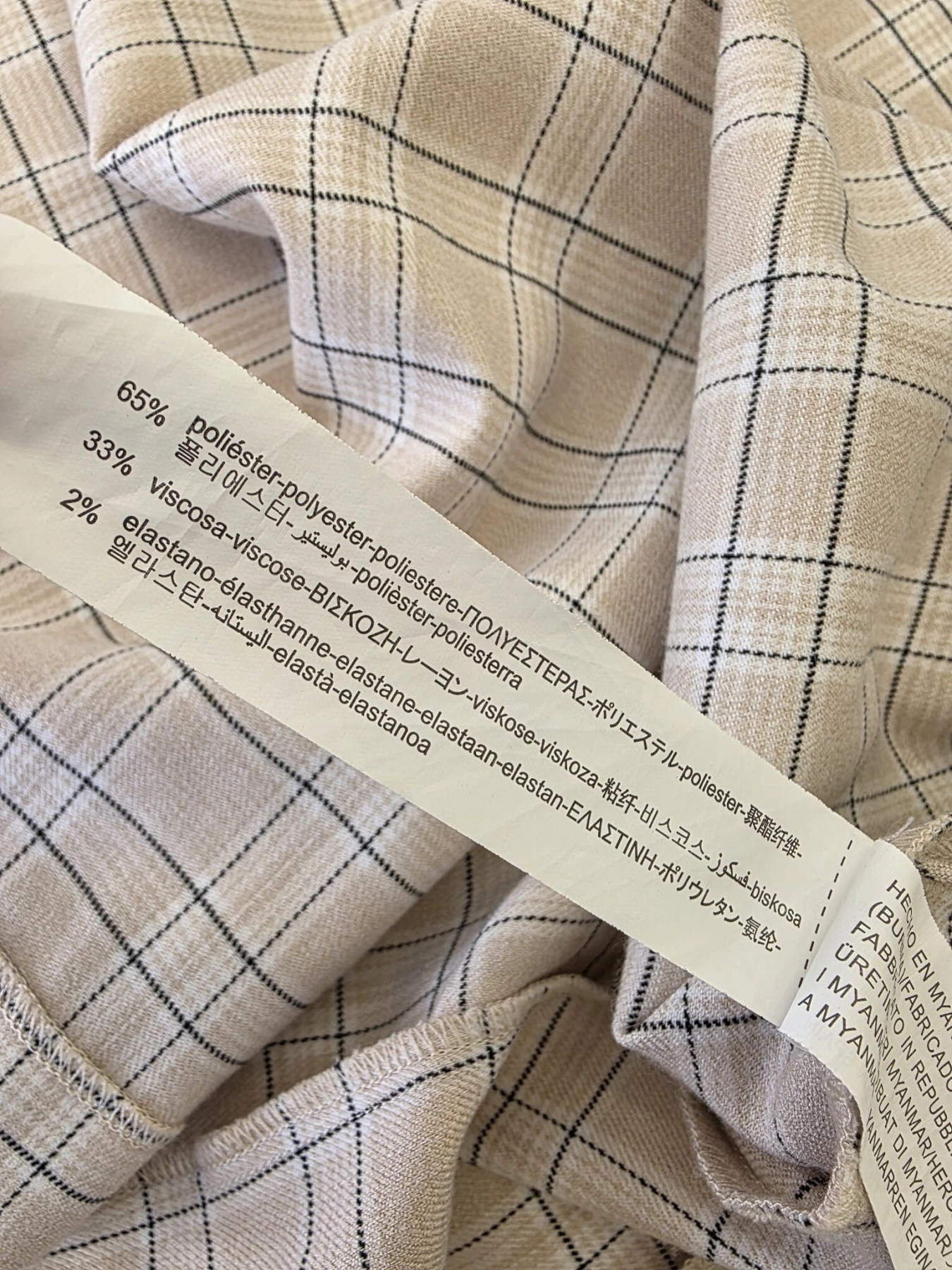 Trzyczęściowy komplet damski premium z marynarką Stradivarius, prążkowanym topem LeGer oraz wełnianą spódnicą Kenar w modnym odcieniu beżu i brązu