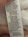 Stylowy komplet damski premium składający się ze spódnicy mini Promod w geometryczne wzory, kremowego topu dzianinowego Tezenis oraz jeansowej katany oversize marki JDY