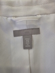 Kremowa marynarka damska H&amp;M o klasycznym kroju z wiskozą, idealna do eleganckich oraz casualowych stylizacji premium