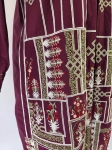 Stylowa damska narzutka premium marki Beech Tree w kolorze śliwkowym, ozdobiona unikalnym, bogatym haftem, idealna do stworzenia wyjątkowej stylizacji w klimacie boho chic