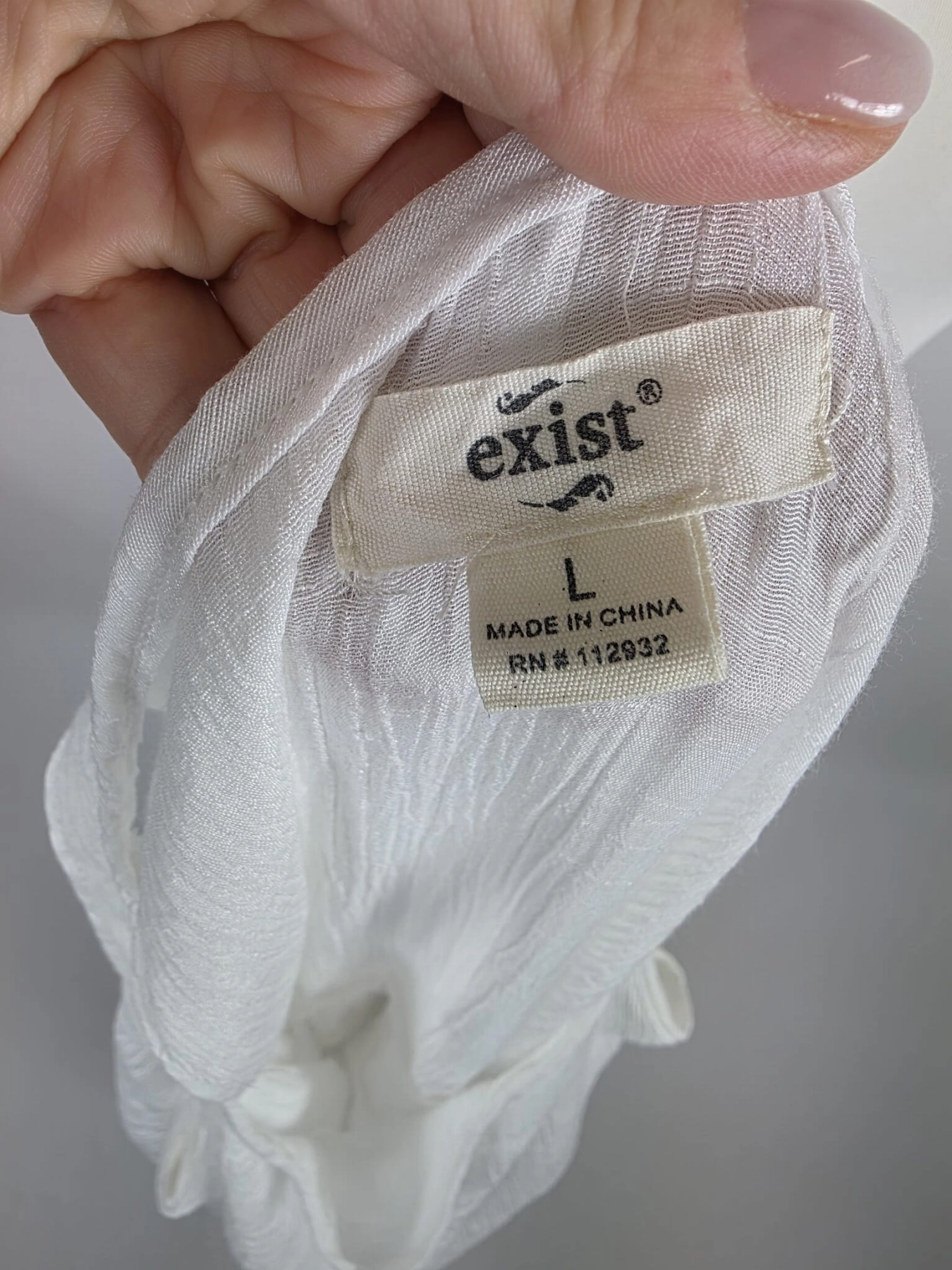 Biała asymetryczna sukienka maxi marki exist w rozmiarze L to idealny wybór na letnie dni dla kobiet ceniących wyjątkowy styl boho i lekkość
