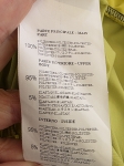 Kobiecy komplet premium składający się z limonkowej asymetrycznej sukienki Rinascimento i czarnej marynarki Zara z perłowymi guzikami na rękawach