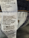 Komplet damski złożony z designerskiej koszuli w paski z tweedowym akcentem oraz oryginalnych jeansów Levi’s Premium świetnie podkreśla kobiecą sylwetkę, gwarantując styl i codzienny komfort
