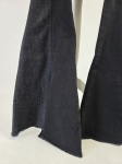 Damska stylizacja ze spodniami dzwonami Salsa Jeans, brązowym topem oraz koszulą w kratkę MOUS to idealny zestaw w stylu retro na co dzień