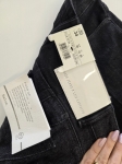 Damska stylizacja ze spodniami dzwonami Salsa Jeans, brązowym topem oraz koszulą w kratkę MOUS to idealny zestaw w stylu retro na co dzień
