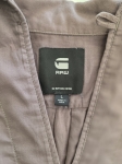 Damski komplet casualowy składający się z luźnej bluzki G-Star RAW oraz szarych jeansów wide leg marki ONLY