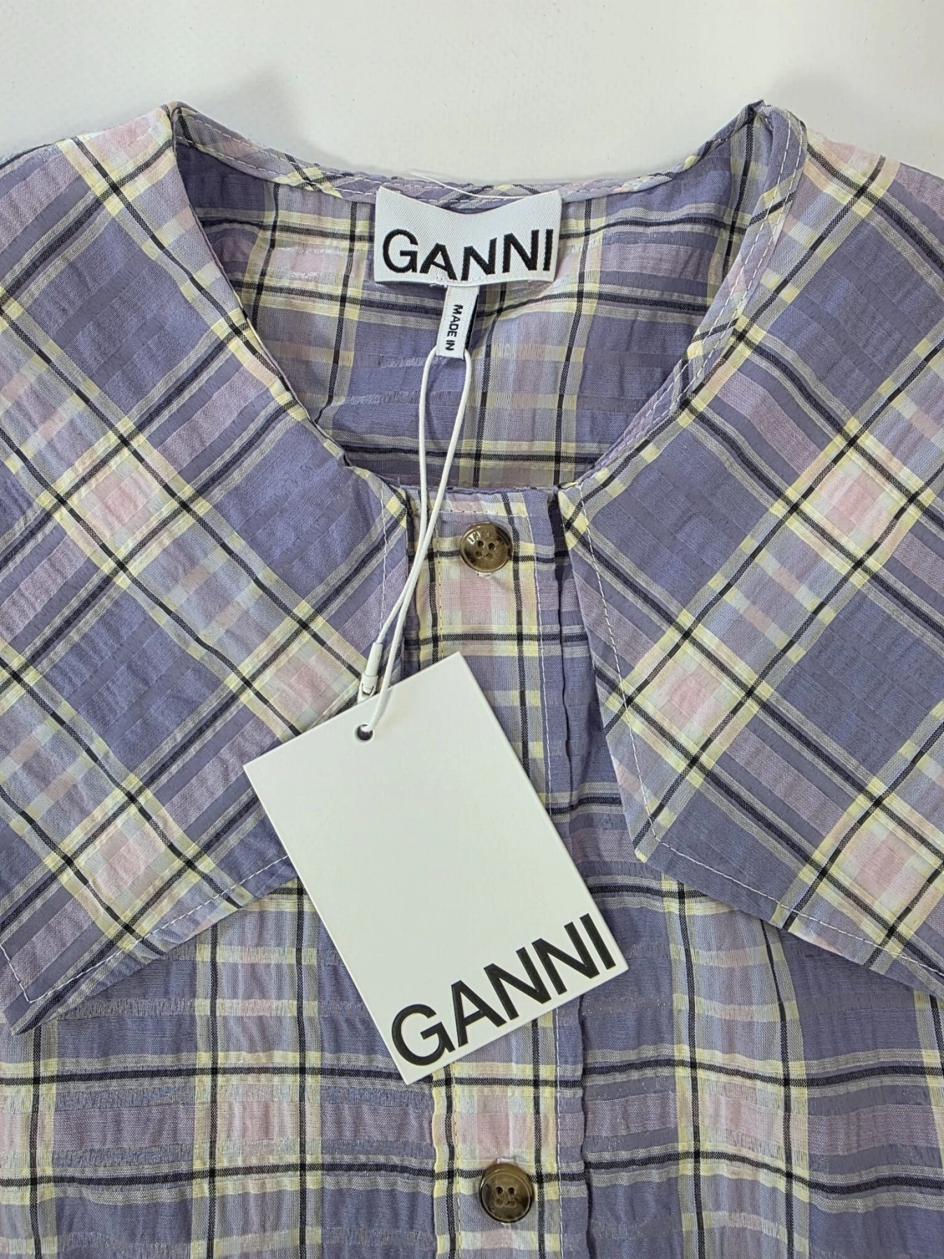 Komplet: designerski top Ganni i cygaretki Zara