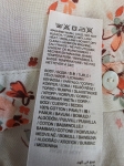 Wiosenna, lekka stylizacja: romantyczna koszula w kwiaty i jeansy rozm. 46