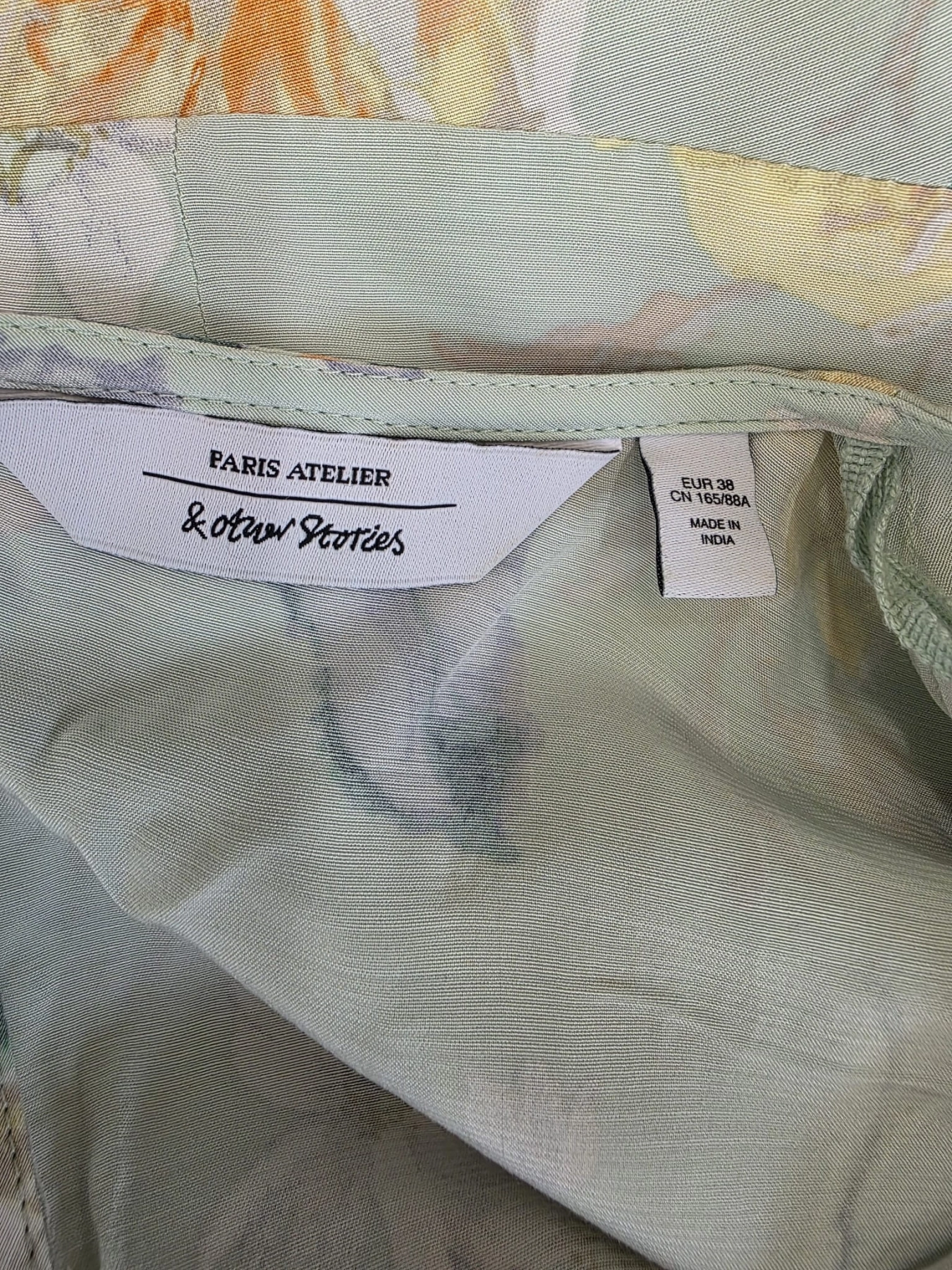 Miętowa sukienka w róże