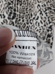 Bluzka w panterkę z czarnymi mankietami od DanHen
