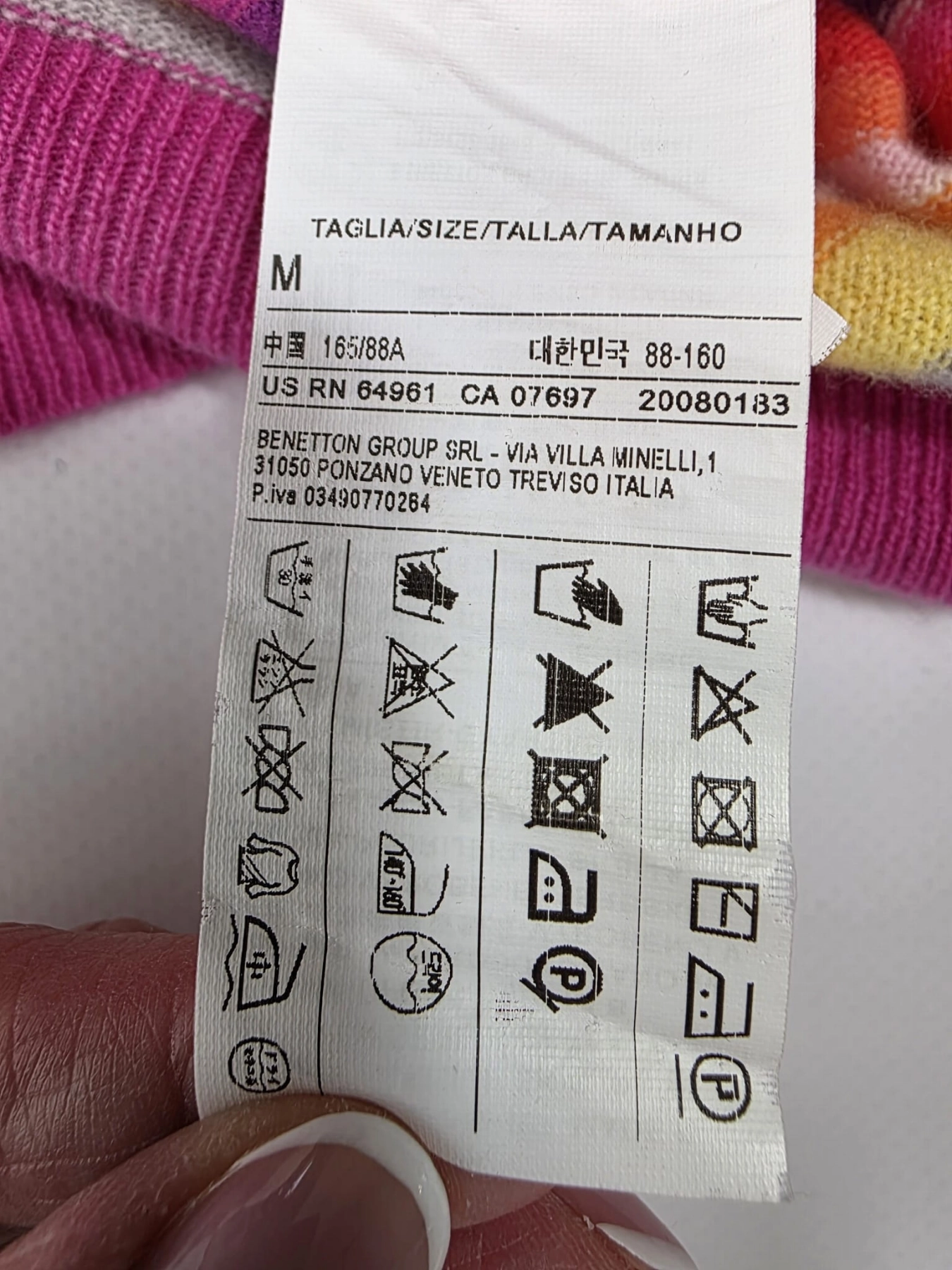 Kolorowy sweter w paski marki Benetton