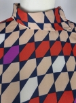 Designerska koszula marki Gestuz z ozdobną stójką